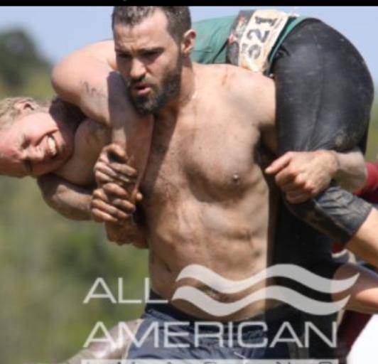 my momma, being carried by some hunky babe - aka one of her teammates during the Mud Run. She's more fit than I am, probably! 